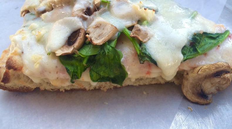 Spinach-mushroom Sicilian pizza from Fellini's Pizza. Photo: Ligaya Figueras