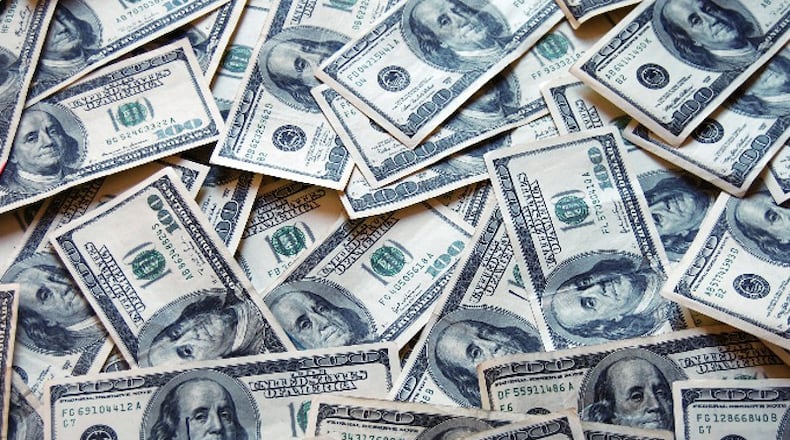 One-time cash payments are a temporary remedy to help families in need, but those payments won’t do much to combat poverty in the long-term according to policy experts. AJC FILE