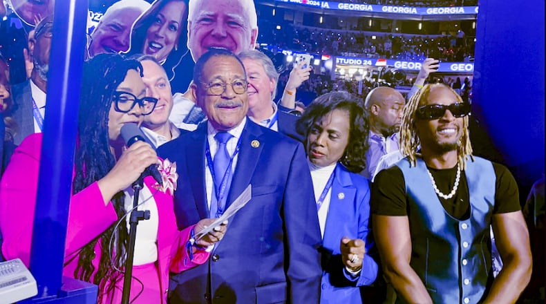 Atlanta rapper Lil John joins the Georgia delegation roll call at the Democratic National Convention. (Tia Mitchell / AJC)