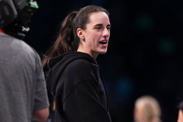 Indiana Fever's Caitlin Clark talks to fans before a WNBA basketball game against the New York Liberty Wednesday, July 16, 2025, in New York. (AP Photo/Frank Franklin II)