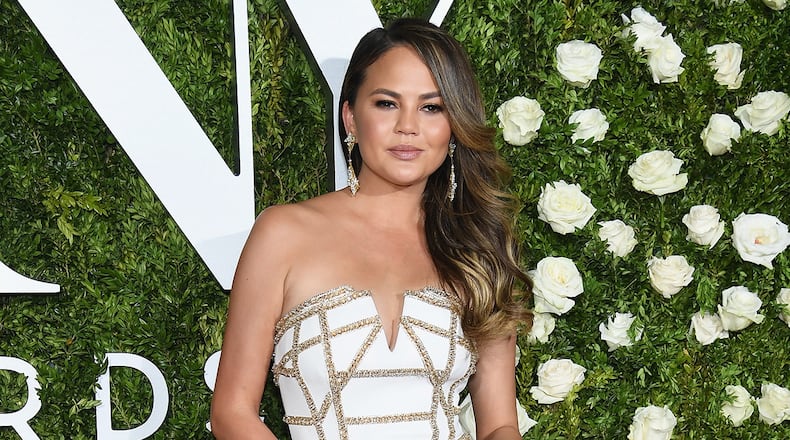 Chrissy Teigen reveals she struggles with alcohol in a new interview with Cosmopolitan.