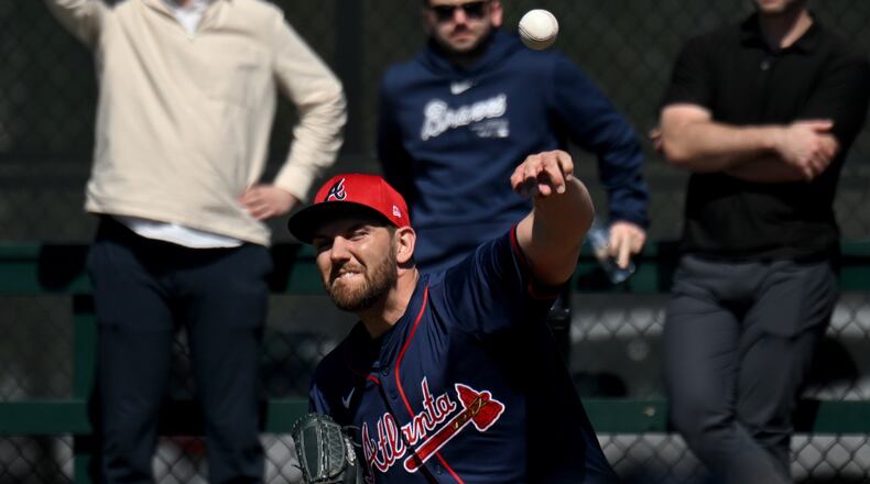 Atlanta Braves relief pitcher Dylan Lee throws in the bullpen during the first full-squad spring training workout at CoolToday Park, Feb. 20, 2024, in North Port, Florida. (Hyosub Shin / Hyosub.Shin@ajc.com)