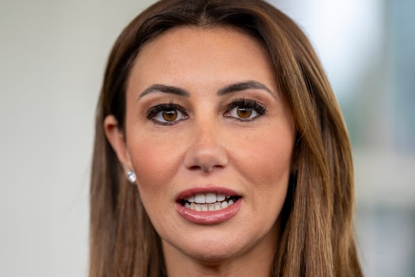 Alina Habba, a former defense lawyer for President Donald Trump who has been named interim U.S. Attorney for New Jersey, speaks to members of the media, Monday, March 24, 2025, outside the White House in Washington. (AP Photo/Jacquelyn Martin)