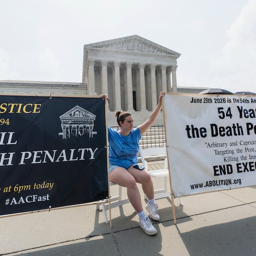 Activists and demonstrators wait outside the Supreme Court for the Justices to release opinions, in Washington, Monday, June 29, 2026. (AP Photo/J. Scott Applewhite)