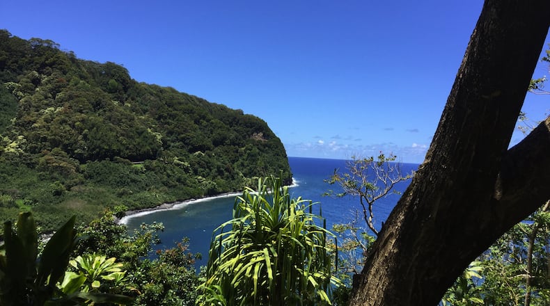 The lookout over Honomanu Bay, at Mile 14 on the way to Hana, does its best to take your breath away. (Bethany Jean Clement/Seattle Times/TNS)
