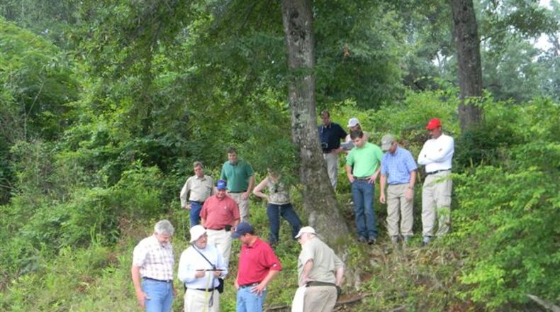 Secretary of State Brian Kemp and several other officials visited the disputed Monroe County boundary on the Ocmulgee River in 2011. The Republican only two counties during his huge victory in July’s GOP runoff for governor, and one of them was Monroe. Photo courtesy of the Monroe County Reporter.