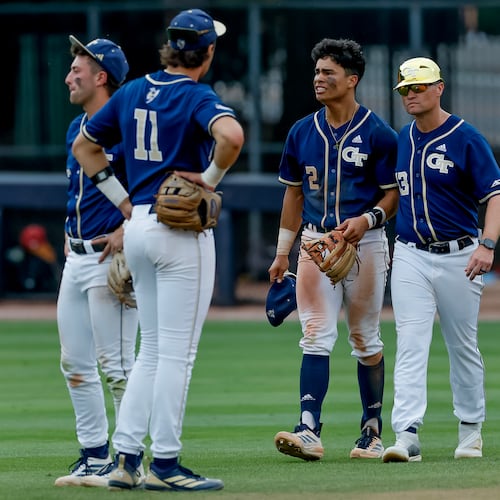 Georgia Tech head coach James Ramsey, right, consoles Jarren Advincula (2), Ryan Zuckerman (11) and Carson Kerce (3), after Oklahoma hit a solo home run against Tech during the 10th inning to win the NCAA D1 Atlanta Regional elimination baseball game at Russ Chandler Stadium, Monday, June 1, 2026, in Atlanta. (Erik S. Lesser for the AJC)