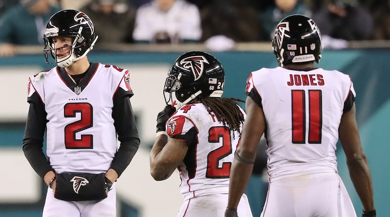 Matt Ryan, Devonta Freeman, and Julio Jones (seen here playing in Philadelphia back in January) will practice in one of their few open-to-the-public training camp sessions on Monday morning. Curtis Compton/ccompton@ajc.com
