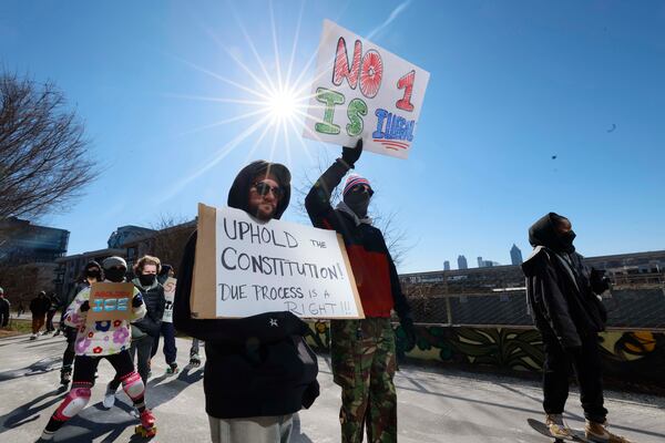 Skaters faced cold weather and punishing winds along the Atlanta Beltline for a "Skaters Against ICE and War" protest on Sunday, Feb. 1, 2026. (Miguel Martinez/AJC)