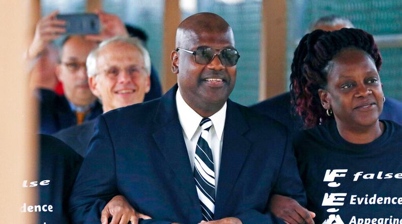 Curtis Flowers, flanked by sister Priscilla Ward, exits the Winston Choctaw Regional Correctional Facility. (Rogelio V. Solis/AP Photo)
