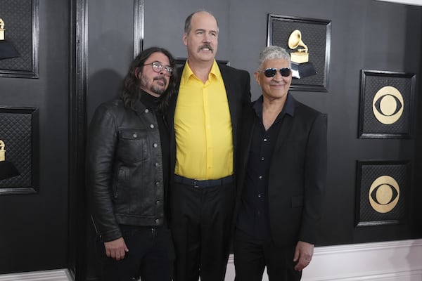 FILE - Dave Grohl, from left, Krist Novoselic, and Pat Smear of Nirvana appear at the 65th annual Grammy Awards on Feb. 5, 2023, in Los Angeles. (Photo by Jordan Strauss/Invision/AP, File)