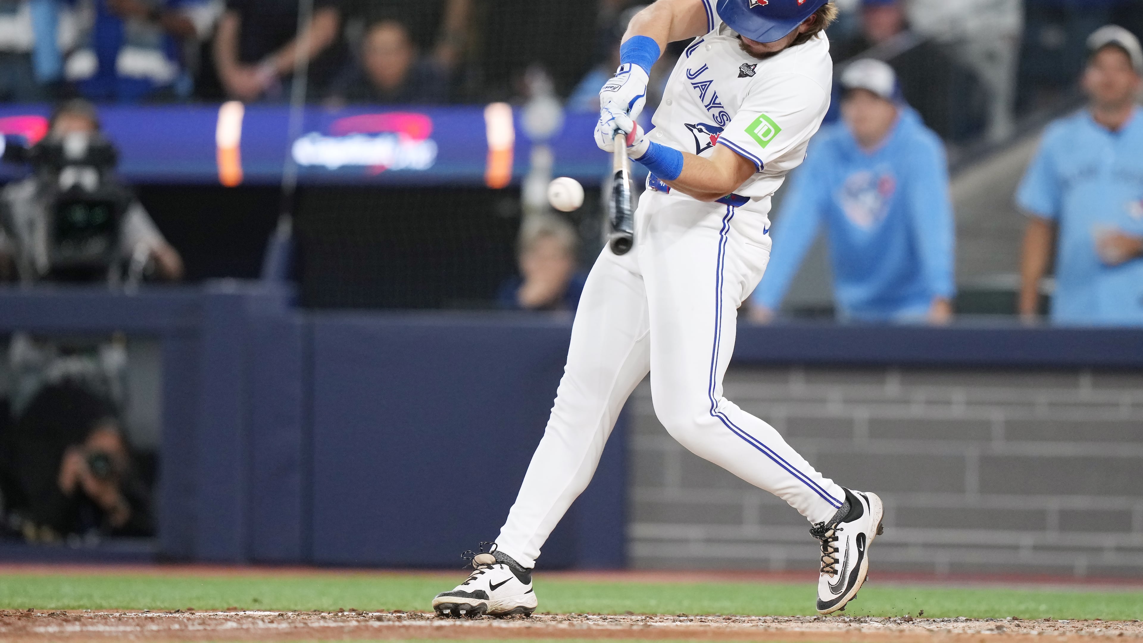 Toronto Blue Jays' Addison Barger hits a grand slam against the Los Angeles Dodgers during the sixth inning in Game 1 of baseball's World Series, Friday, Oct. 24, 2025, in Toronto. (Nathan Denette/The Canadian Press via AP)