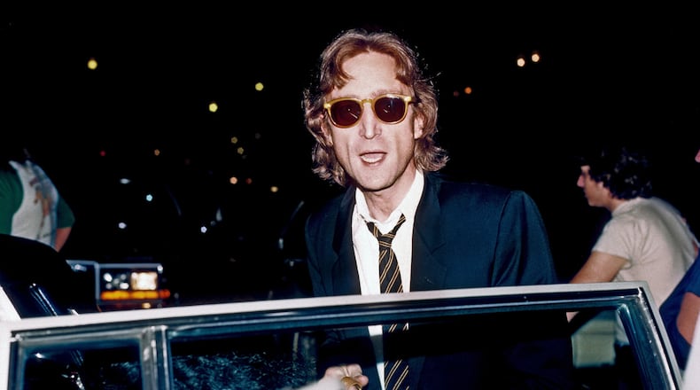 Former Beatle John Lennon arrives at the Times Square recording studio 'The Hit Factory' before a recording session of his final album 'Double Fanasy' in August 1980 in New York City, New York. (Photo by Vinnie Zuffante/Michael Ochs Archives/Getty Images)