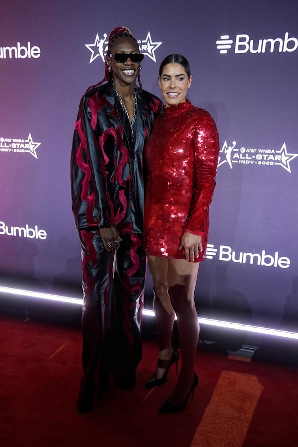 Atlanta Dream's Rhyne Howard and Los Angeles Sparks's Kelsey Plum, from left, pose on the orange carpet for WNBA All Star basketball events, Thursday, July 17, 2025, in Indianapolis. (AP Photo/Darron Cummings)
