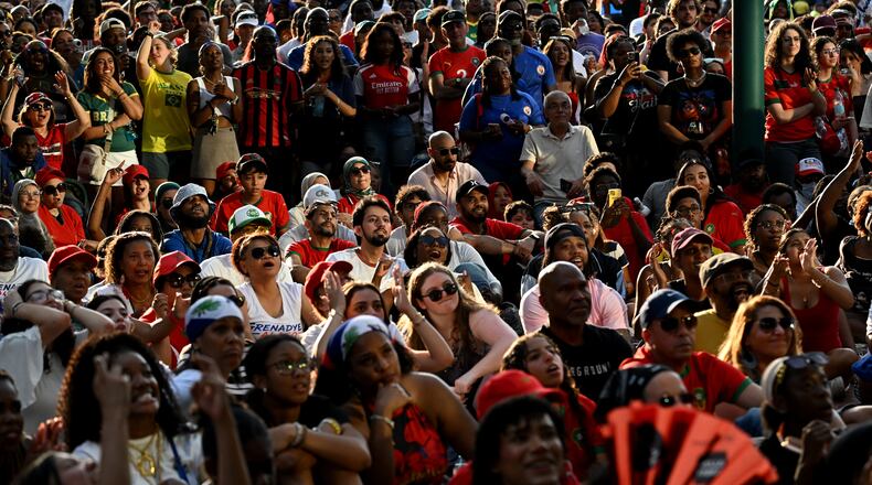 Soccer fans gather to watch the World Cup match between Morocco and Haiti at the FIFA Fan Festival in Centennial Olympic Park on Wednesday, June 24, 2026, in Atlanta. High temperatures on Saturday are expected to reach 92 degrees, according to the National Weather Service. (Hyosub Shin/AJC)