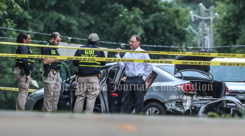 A driver suspected in a Chamblee kidnapping was shot and killed Tuesday morning during a police chase in Decatur, according to the GBI.