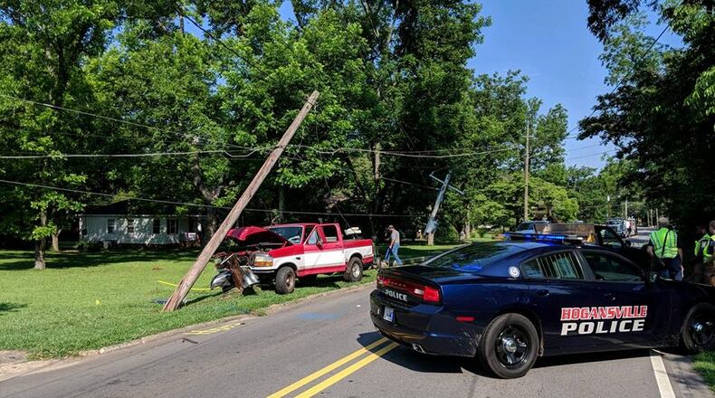 A teenager fell asleep while driving and knocked down two power lines in Hogansville, police said.