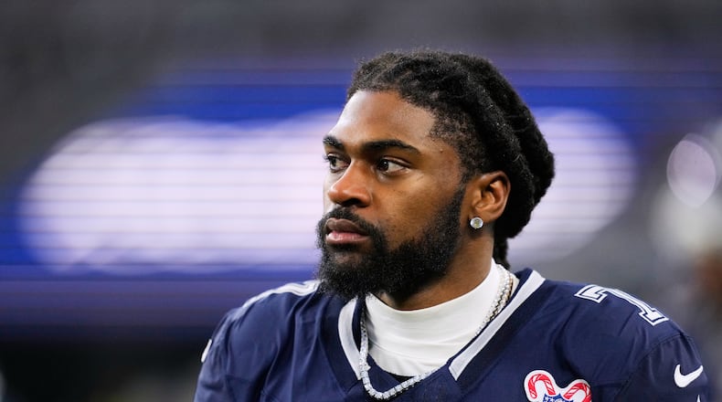 FILE - Dallas Cowboys cornerback Trevon Diggs (7) walks along the sideline during the first half of an NFL football game against the Los Angeles Chargers, Dec. 21, 2025, in Arlington, Texas. (AP Photo/Tony Gutierrez, File)