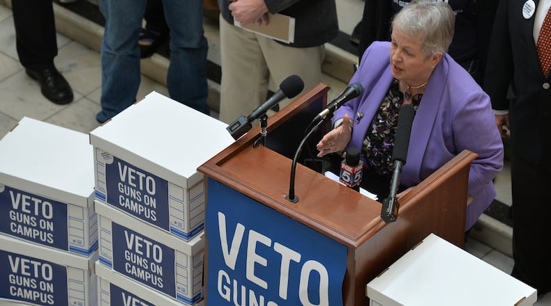 Sen. Nan Orrock speaks during a March rally opposing campus carry. The group delivered 30,000 petitions to Gov. Nathan Deal's office urging a veto of the bill that would allow those 21 years and older to carry a weapon on college campus. BRANT SANDERLIN/BSANDERLIN@AJC.COM