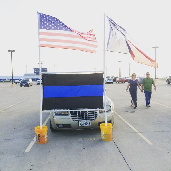 Supporters arrive at a vigil for Brent Thompson. Photo: Jennifer Brett