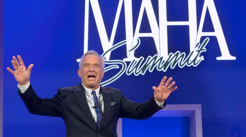 FILE - Health and Human Services Secretary Robert F. Kennedy, Jr., arrives on stage at the inaugural Make America Healthy Again summit, Nov. 12, 2025, in Washington. (AP Photo/Rod Lamkey, Jr., File)