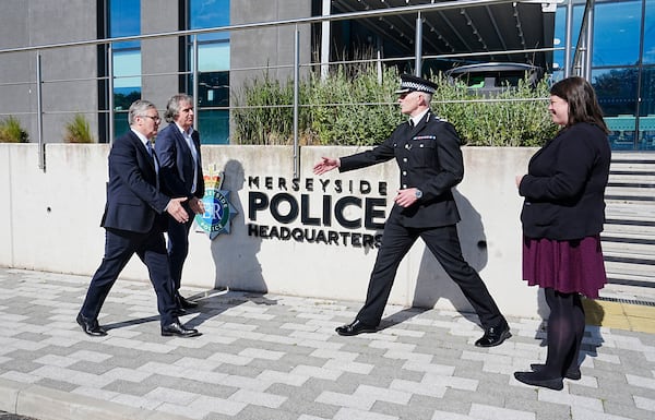 Britain's Prime Minister Keir Starmer, left, meets with Police and Crime Commissioner Emily Spurrell, right, Deputy Chief Constable Chris Green, second right, and the Mayor of Liverpool City Region, Steve Rotheram, at Merseyside Police Headquarters, in Liverpool, England, Wednesday, May 28, 2025. (Peter Byrne/Pool photo via AP)