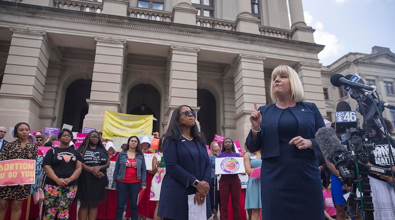 Staci Fox, CEO and President of Planned Parenthood Southeast, speaks during an anti-abortion rally outside of the Georgia State Capitol building following the signing of HB 481 in Atlanta, Tuesday, May 7, 2019.    (ALYSSA POINTER/ALYSSA.POINTER@AJC.COM)