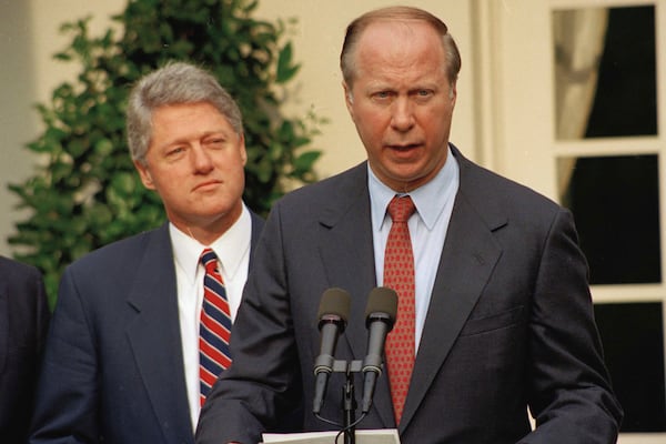 FILE - President Clinton listens to David Gergen during a Rose Garden news conference Saturday, May 29, 1993. (AP Photo/J. Scott Applewhite, File)