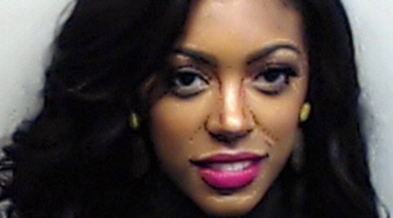Porsha Williams had time to put on makeup and do her hair for her mug shot since she voluntarily turned herself in for misdemeanor battery. CREDIT: APD