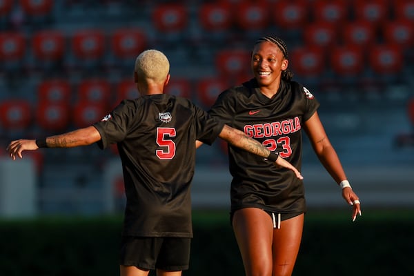 Georgia forward Mya Townes (right) celebrates her goal with midfielder Sage Glover during their “Soccer in Sanford” game against James Madison on Thursday, Aug. 20, 2026, in Athens. (Jason Getz/AJC)