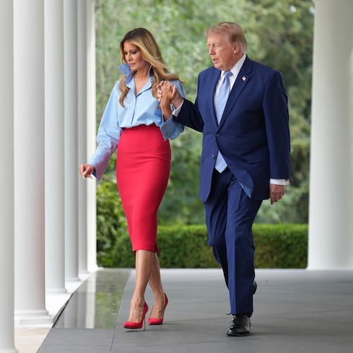 President Donald Trump, right, and first lady Melania Trump walk to attend an event in the Rose Garden of the White House, Thursday, Aug. 20, 2026, in Washington. (AP Photo/Jacquelyn Martin)