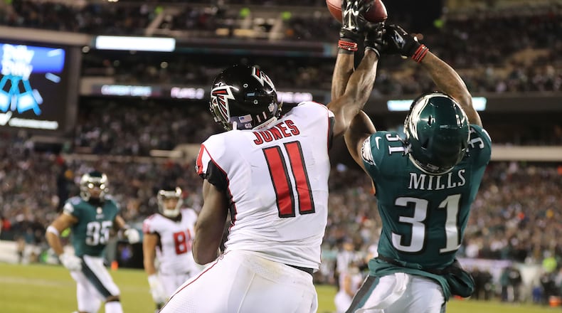 Eagles cornerback Jalen Mills defends against Falcons wide receiver Julio Jones breaking up a pass to the endzone during the first half in their NFC Divisional Game on Saturday, January 13, 2018, in Philadelphia.    Curtis Compton/ccompton@ajc.com