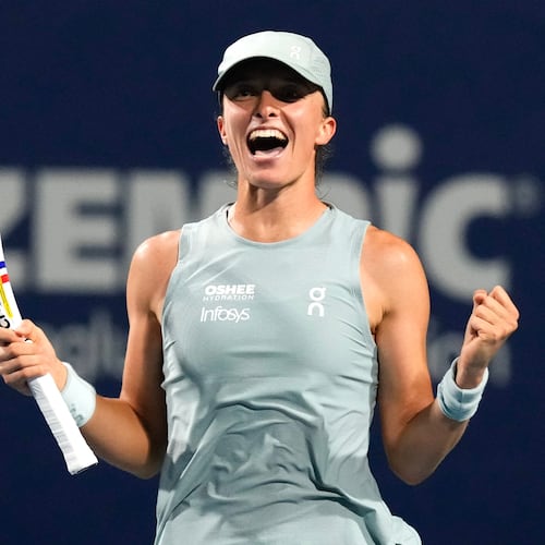 Poland's Iga Swiatek celebrates her 6-3 1-6 6-3 win over Ukraine's Elina Svitolina in a National Bank Open semifinal tennis match in Toronto on Wednesday, August 12, 2026. (Chris Young/The Canadian Press via AP)