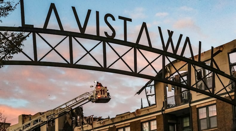 Two people were arrested after residents were forced to evacuate the Reserve at LaVista Walk apartments after a fire broke out Friday.