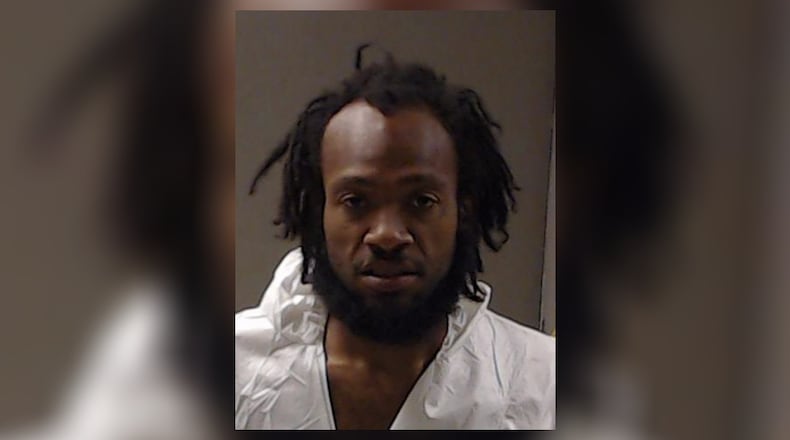 David Johnson is suspected of stabbing his sister to death.