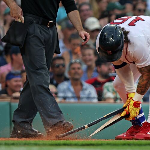 Boston Red Sox's Jarren Duran snaps his bat after striking out to end the eighth inning of a baseball game against the Athletics, Saturday, Aug. 8, 2026, in Boston. (AP Photo/Jim Davis)