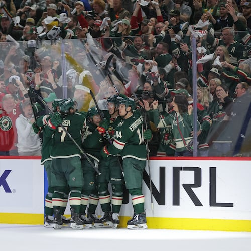 Minnesota Wild left wing Matt Boldy, second from the right, celebrates with teammates after scoring during the third period of Game 6 in the first round of the NHL hockey Stanley Cup playoff series against the Dallas Stars, Thursday, April 30, 2026, in St. Paul, Minn. (AP Photo/Bailey Hillesheim)