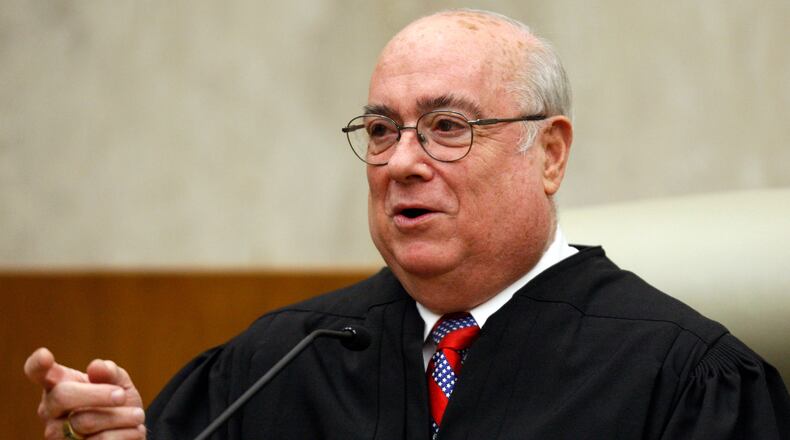 FILE - U.S. District Judge Royce C. Lamberth is seen during a ceremony at the federal courthouse in Washington on May 1, 2008. (AP Photo/Charles Dharapak, File)