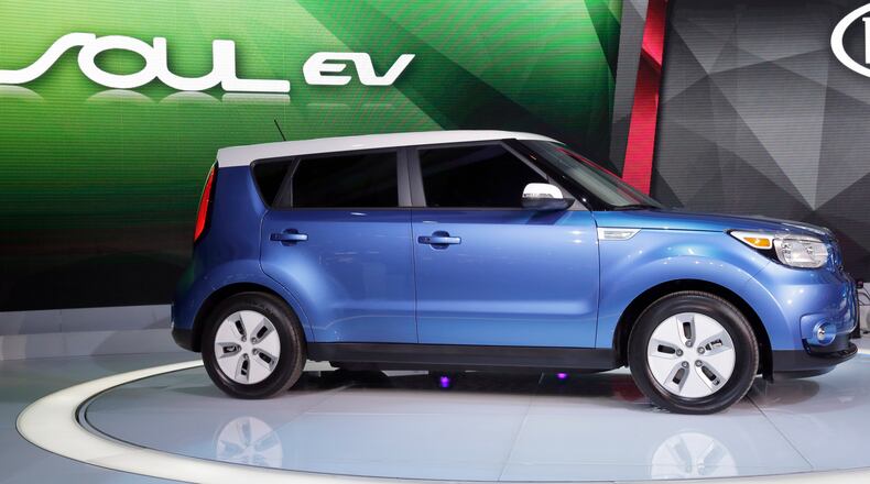 Kia introduces the Soul EV at the Chicago Auto Show in Chicago, Thursday, Feb. 6, 2014. Chicago Auto Show will be open to the public February 8 through February 17. (AP Photo/Nam Y. Huh)