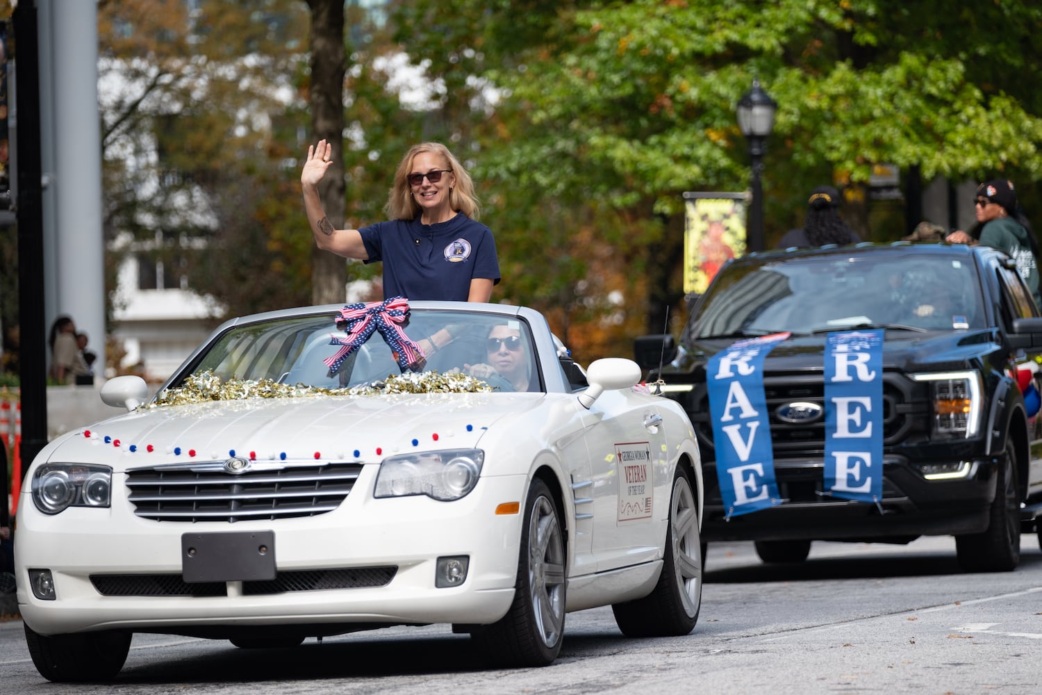 Retired Army Lt. Col. Raquel Durden, who was named the Georgia Woman Veteran of the Year, People rides in the Georgia Veterans Day Parade in Midtown Atlanta on Saturday, Nov. 8, 2025.   Ben Gray for the Atlanta Journal-Constitution