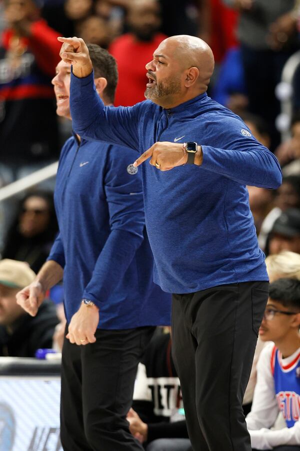 Detroit Pistons head coach J.B. Bickerstaff, right, shouts to his team during the second half of Game 4 of an NBA basketball first-round playoff series against the New York Knicks, Sunday, April 27, 2025, in Detroit. (AP Photo/Duane Burleson)