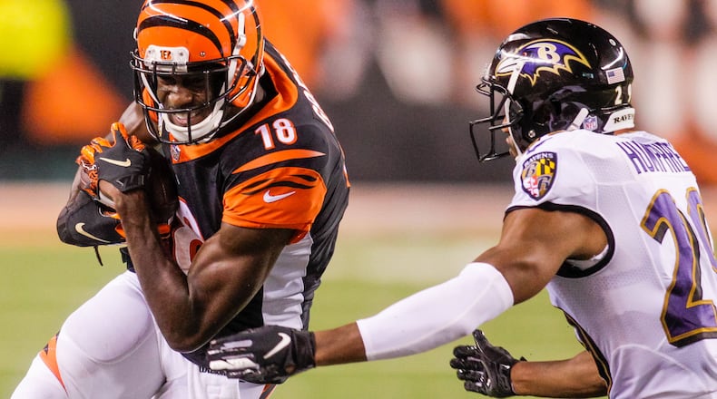 Cincinnati Bengals wide receiver A.J. Green carries the ball in for a touchdown during their game against the Baltimore Ravens Thursday, Sept. 13 at Paul Brown Stadium in Cincinnati.