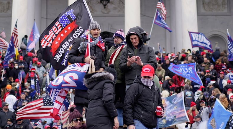 Protesters storm the Capitol and halt a joint session of the 117th Congress on Jan. 6 in Washington. (Kent Nishimura/Los Angeles Times/TNS)