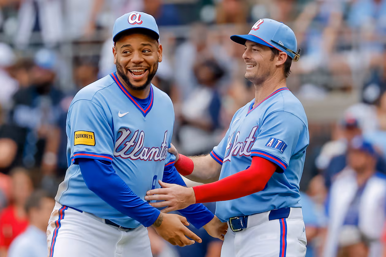 Atlanta Braves' Dominic Smith, left, reacts with teammate Mike Yastrzemski, right, after the Braves defeated the Pittsburgh Pirates in a baseball game, Saturday, June 6, 2026, in Atlanta. (AP Photo/Erik S. Lesser)