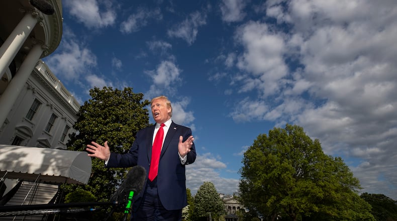 FILE - In this May 1, 2020, file photo President Donald Trump speaks with reporters as he departs the White House in Washington. (AP Photo/Alex Brandon, File)