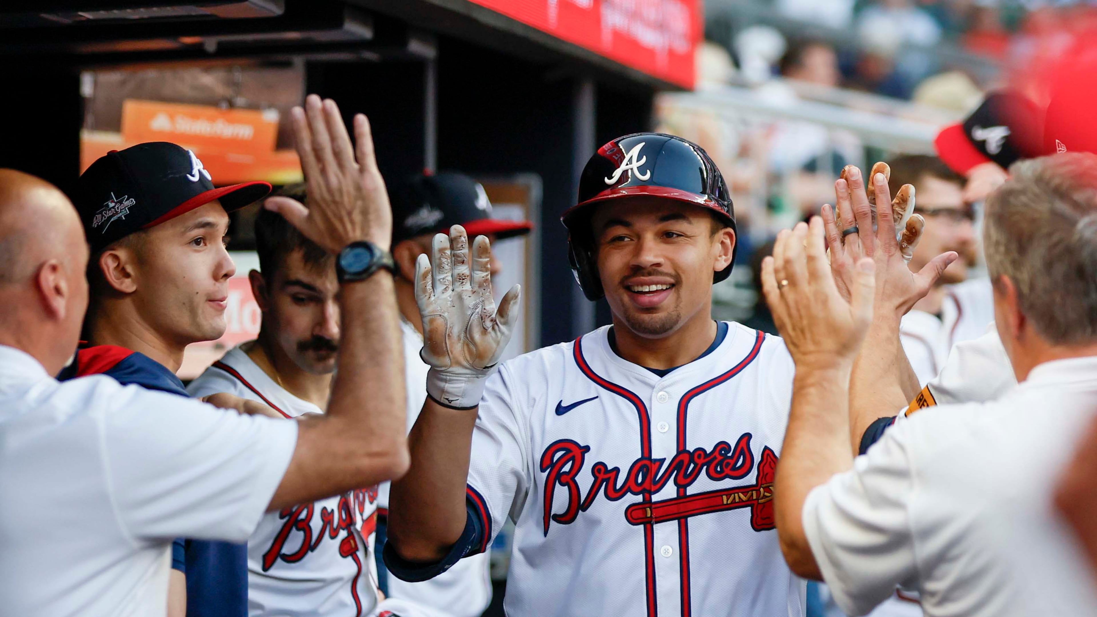 Atlanta Braves rookie catcher Drake Baldwin (center), here being congratulated by teammates after a home run June 3, is batting .287 with an OPS of .807, 19 RBIs and seven home runs this season. (Miguel Martinez/AJC)