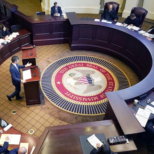 FILE - Mississippi Supreme Court justices, right, listen to arguments in Jackson, Miss., July 6, 2023. (AP Photo/Rogelio V. Solis, File)