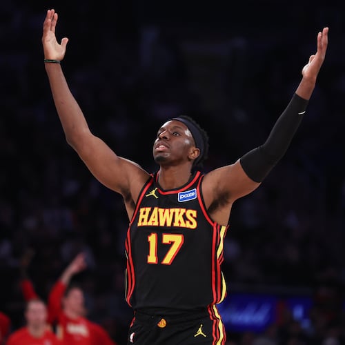 Atlanta Hawks forward Onyeka Okongwu reacts after scoring a 3-point basket during first half of an NBA basketball game against the New York Knicks, Friday, Jan. 2, 2026, in New York. (AP Photo/Heather Khalifa)