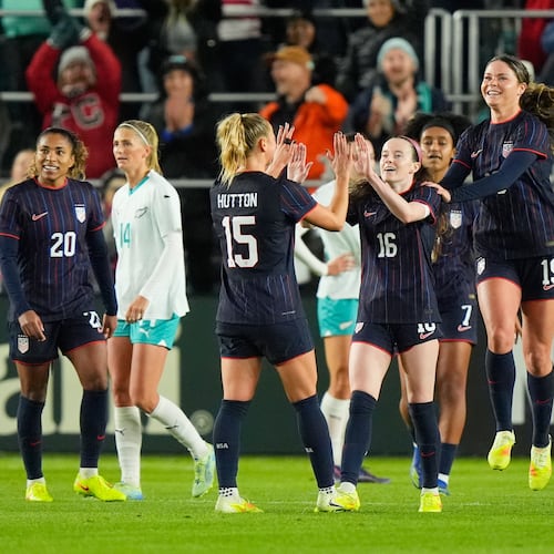 United States midfielder Rose Lavelle (16) celebrates with teammates after scoring a goal during the first half of a women's international friendly soccer match against New Zealand, Wednesday, Oct. 29, 2025, in Kansas City, Mo. (AP Photo/Charlie Riedel)
