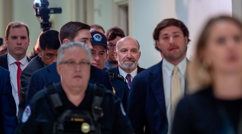 Commerce Secretary Howard Lutnick arrives for a deposition as part of the House Oversight Committee's investigation of convicted sex offender Jeffrey Epstein, at the Capitol in Washington, Wednesday, May 6, 2026. (AP Photo/J. Scott Applewhite)